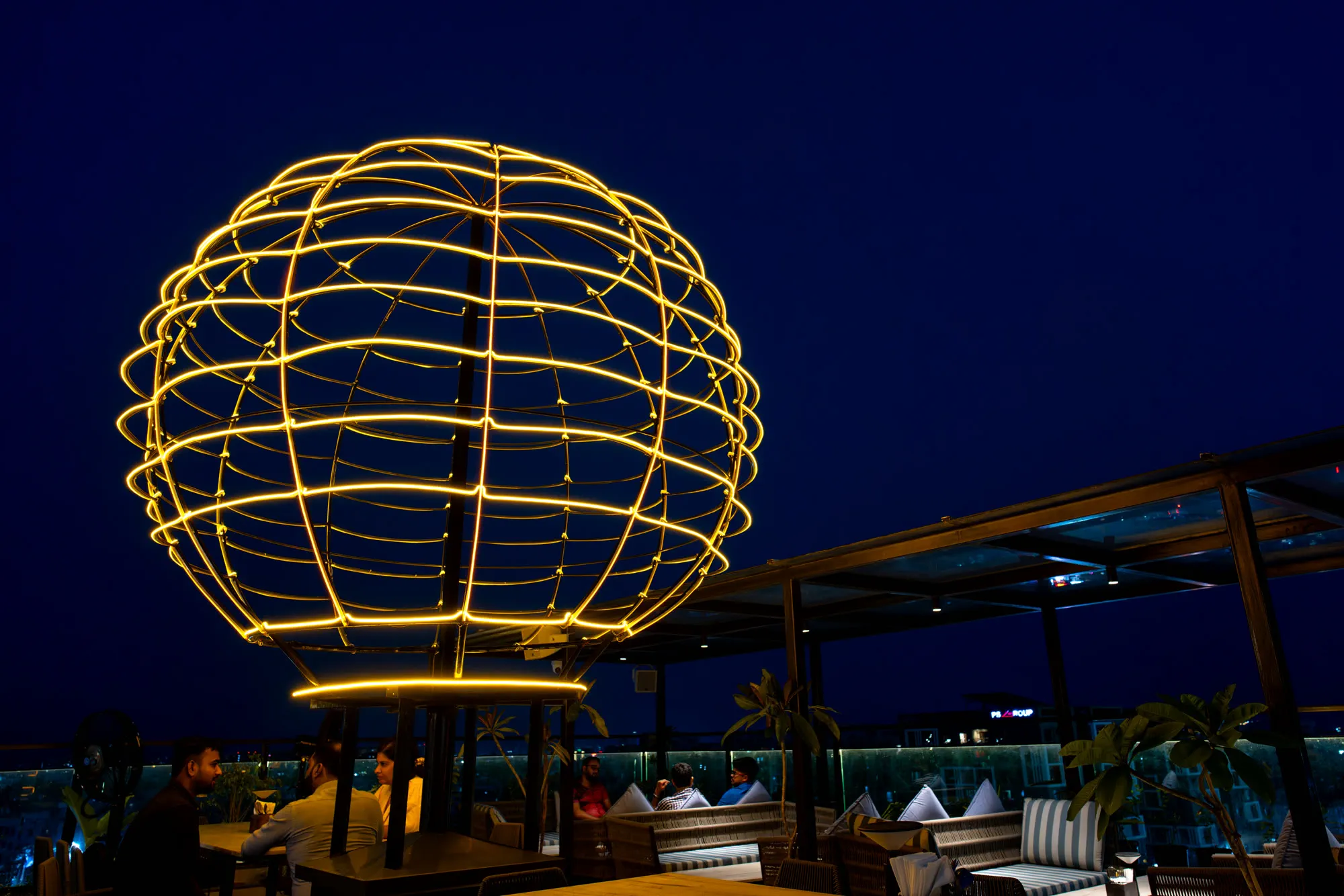 The finished balloon structure lit at night