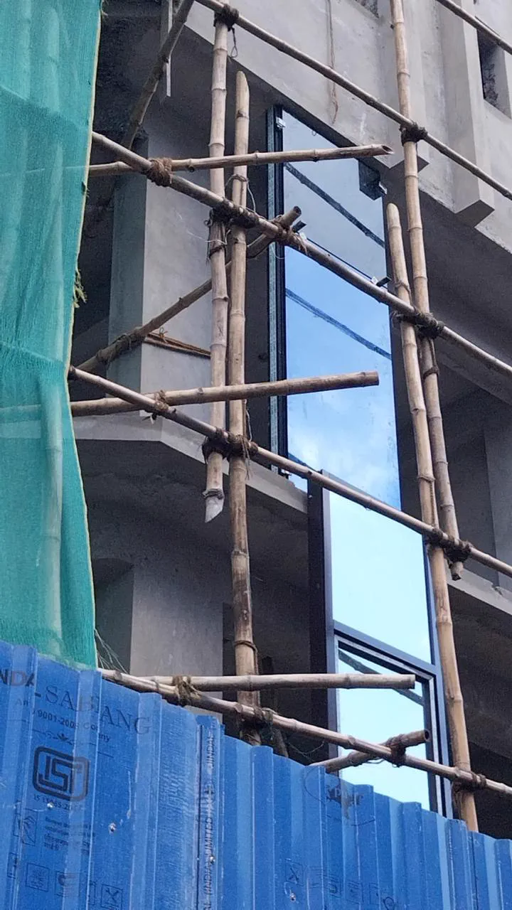 Tinted glass being trialled in a facade opening on site