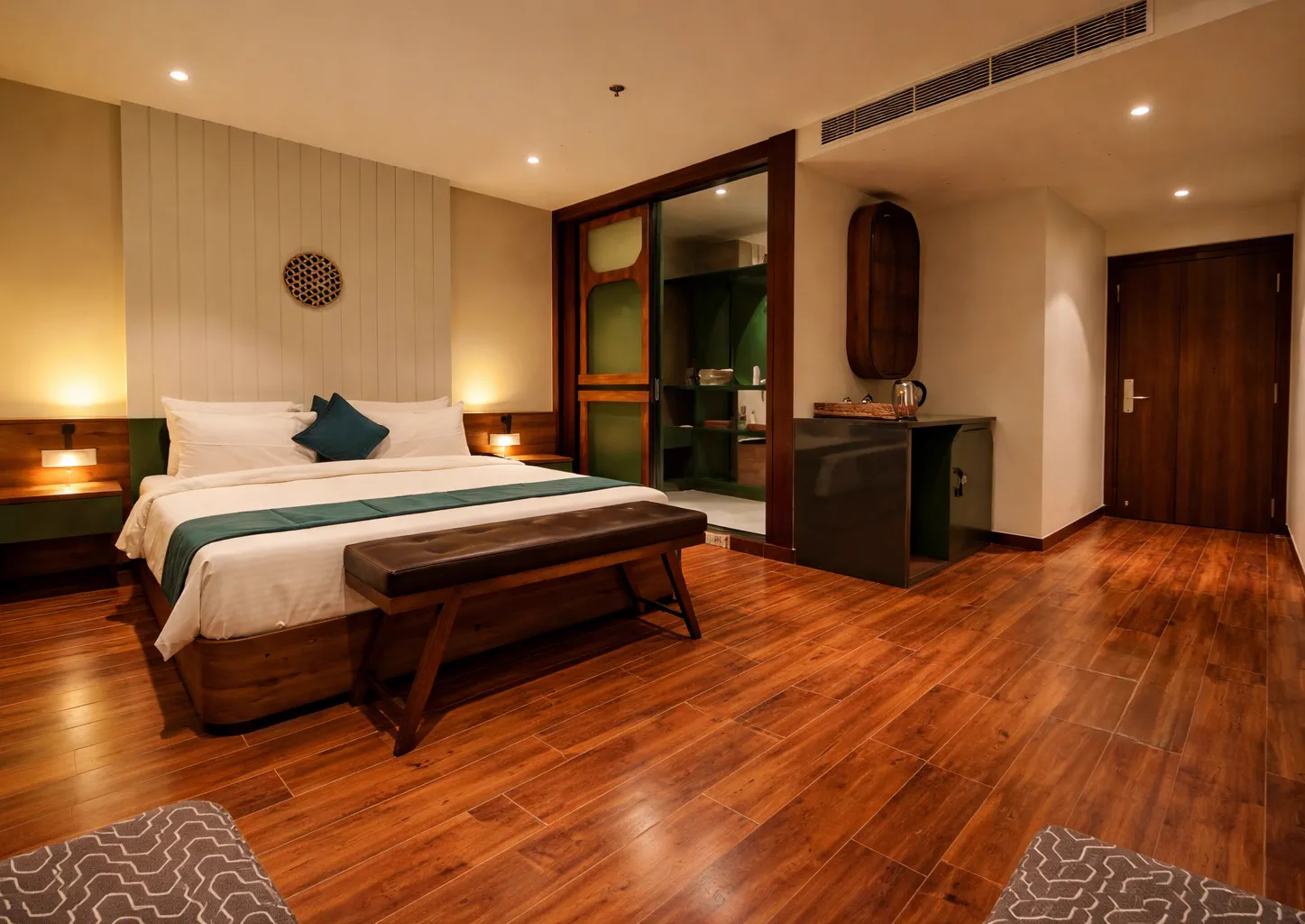 A finished city-side room with the bathroom screen and minibar counter