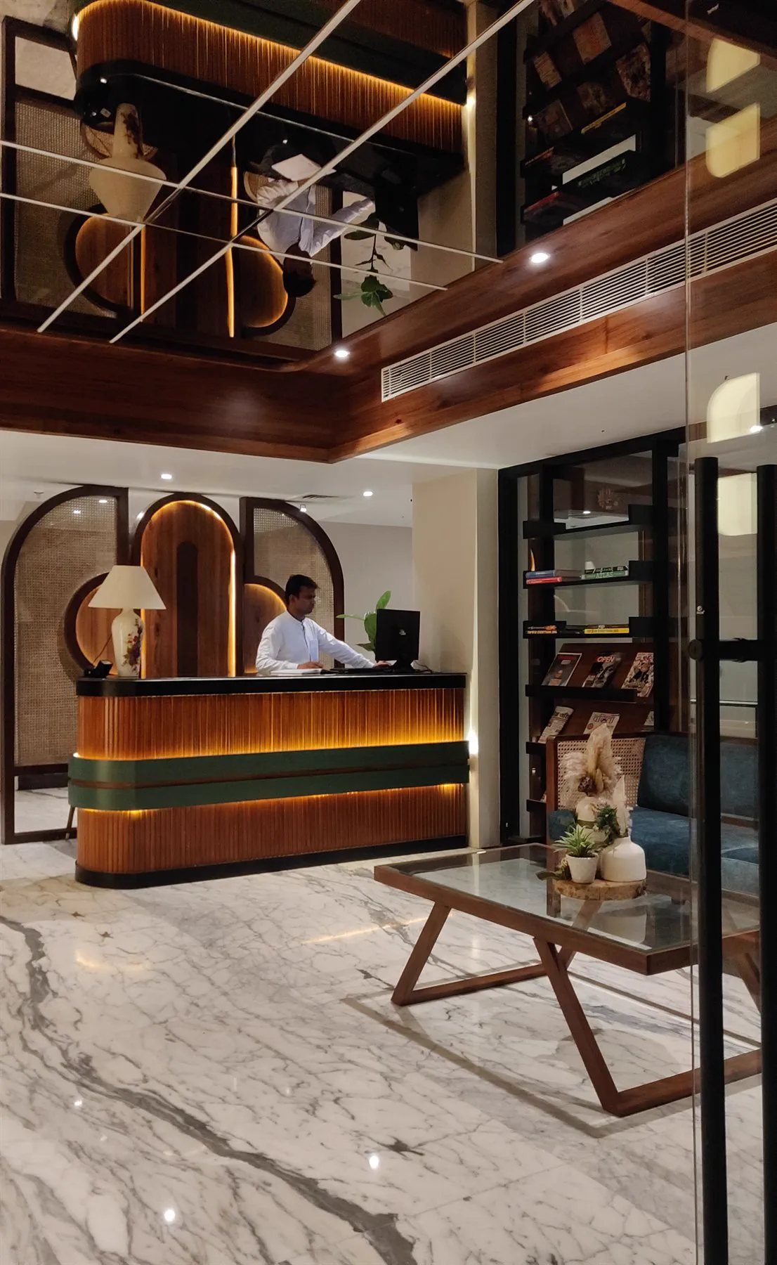 Convoy Hotel, the reception desk as built, with the mezzanine above