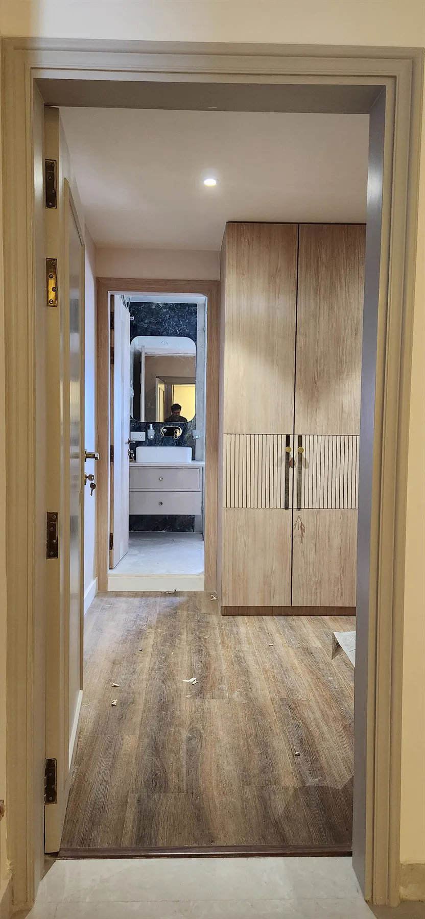 Looking into the guest bedroom and through to its bathroom beyond