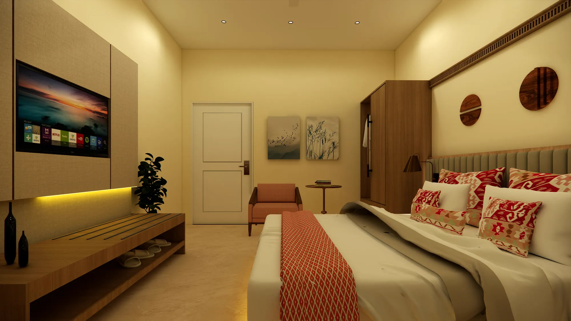The standard room looking back at the entrance doorway, an armchair and side table in the corner