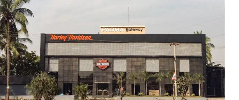 The Harley-Davidson dealership next door under the Padma Gateway sign