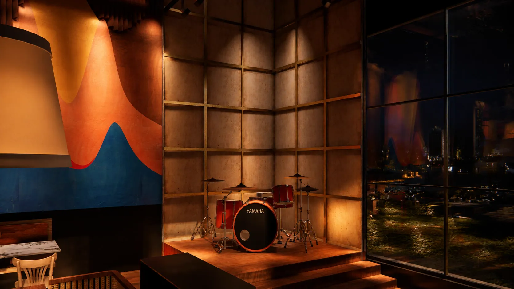 The stage in its corner, a drum kit against a backlit grid of panels