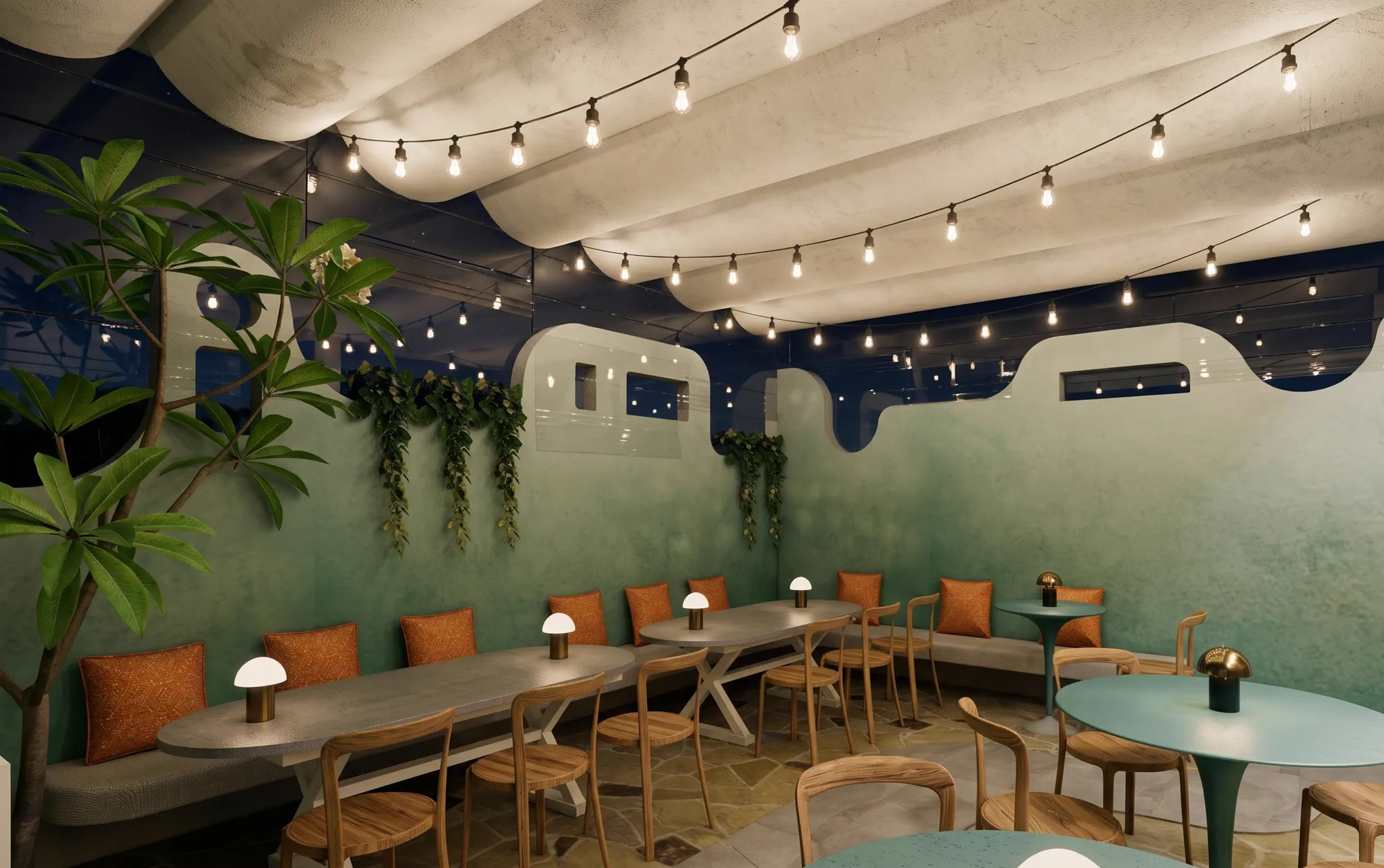 The long side of the terrace, a built-in bench running the length of an ombr&eacute; green wall beneath a wavy parapet