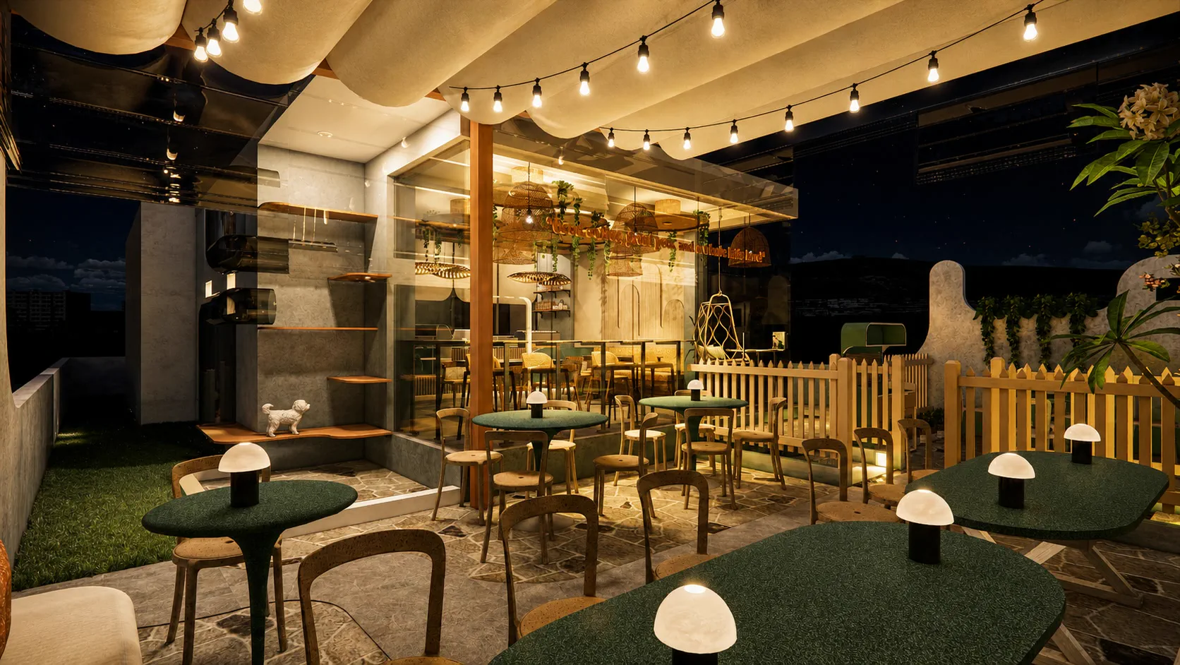 The terrace at night, festoon lights under a scalloped fabric canopy, green-topped tables with cordless lamps, and a picket-fenced pet run