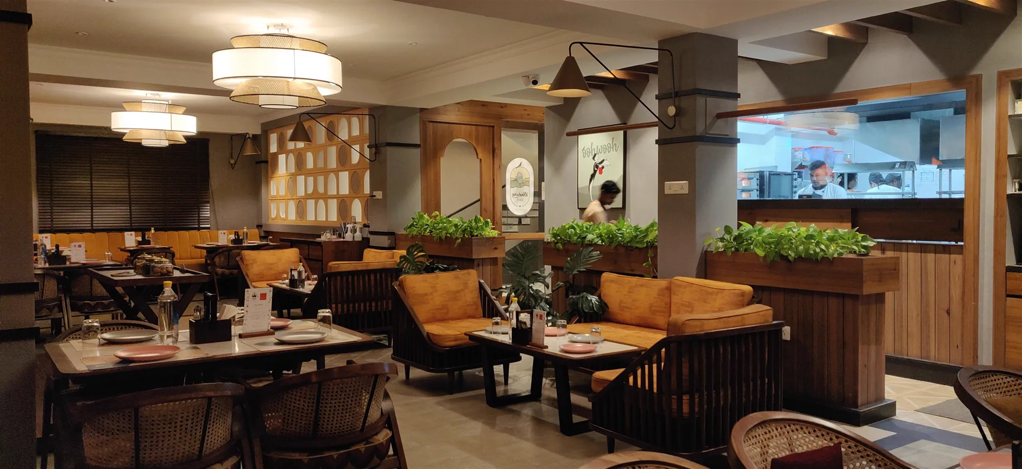 Windsong Cafe’s dining hall, timber beams and pendant lights