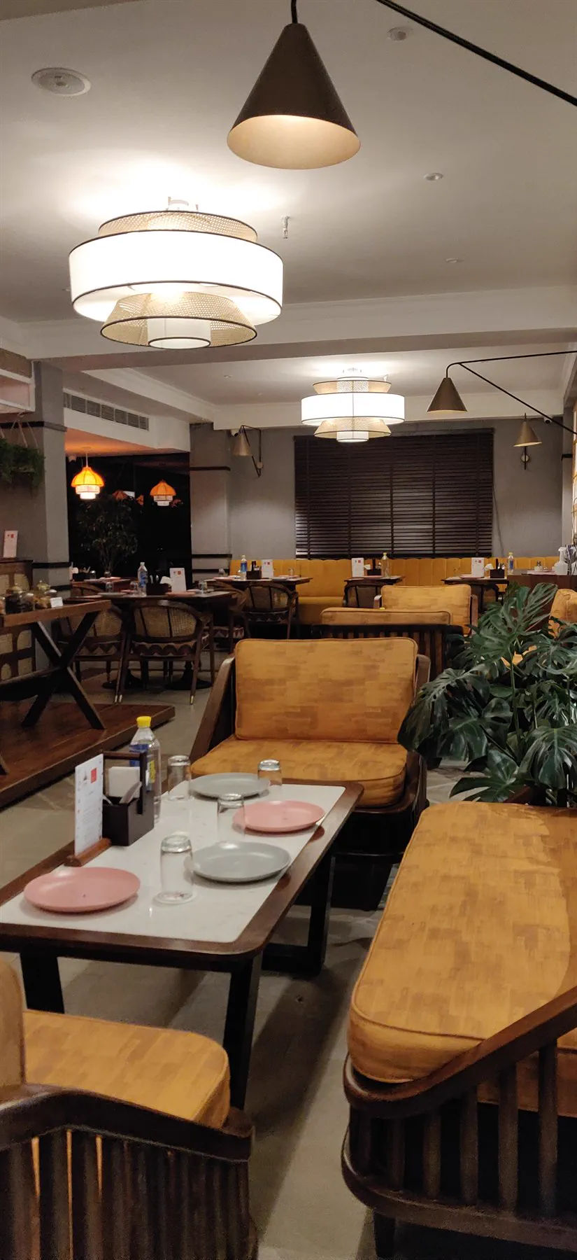 The dining room from the corner, looking back across the tables