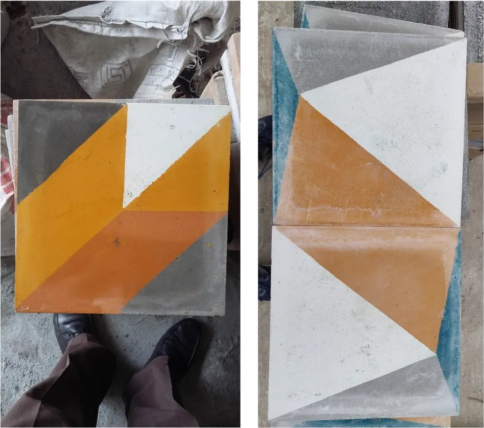 Geometric cement tiles being selected on site